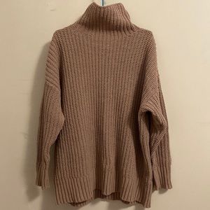 This is a soft knit sweater from Aerie. The condition of it is new.